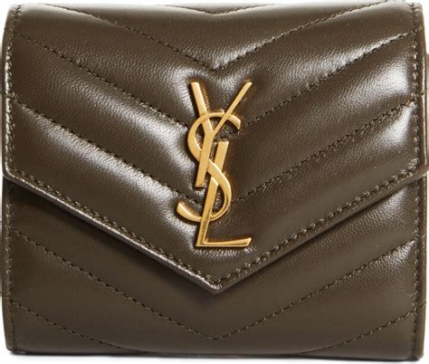 monogram matelassé leather trifold wallet